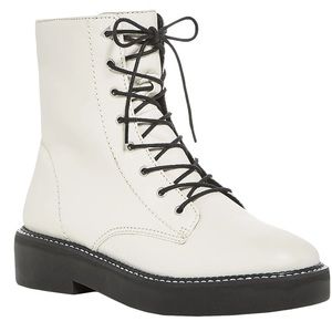 White combat boots are the in thing. Worn once like new